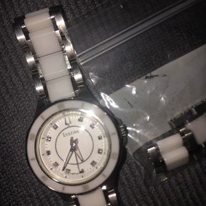 Bulova Women’s watch w/ ALL links